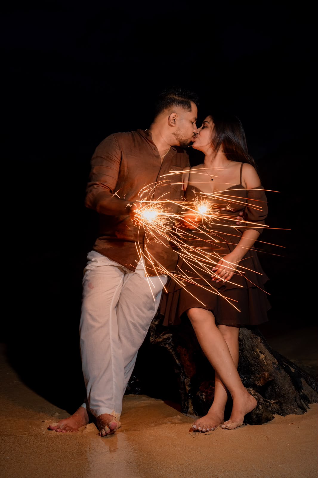 Romantic kiss with sparkling light effects